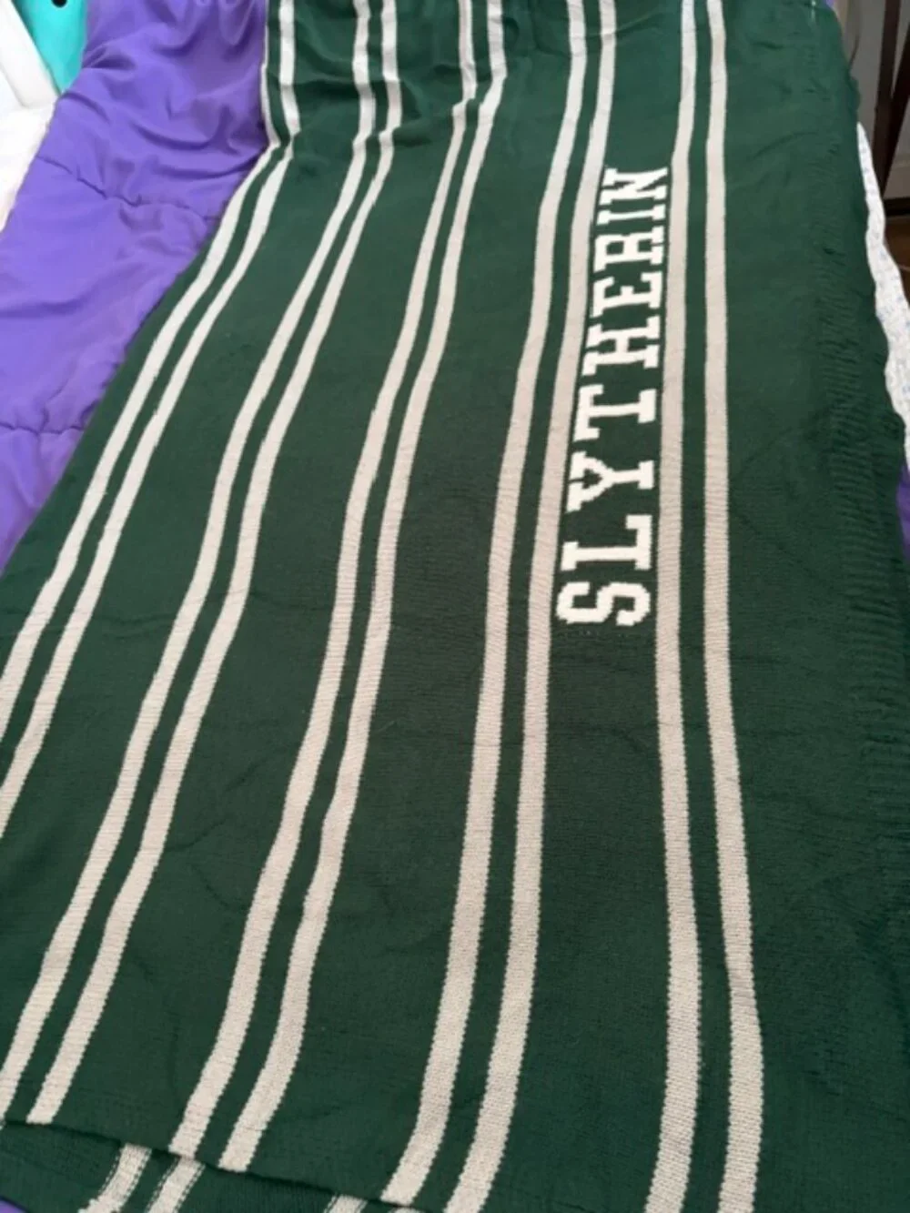 Gently used Harry Potter™ Collegiate Stripe House Throw Green Stripe Slytherin